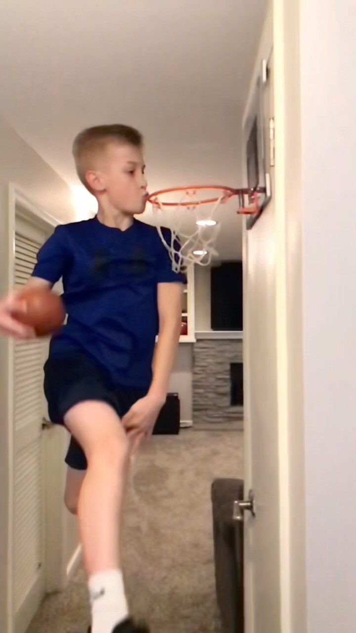 Hoopin Nate Took a Million Jumps Before SportsCenter Ever Noticed 1 Nathaniel Hoopin Nate Kenney dunking on a plastic mini hoop mounted in his kitchen